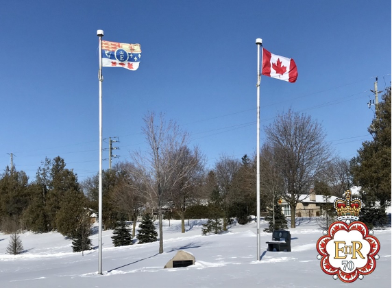 The Queen's Canadian Royal Standard flying over Memorial Park, in Waterdown, Ontario. February 6, 2022—Accession Day.
